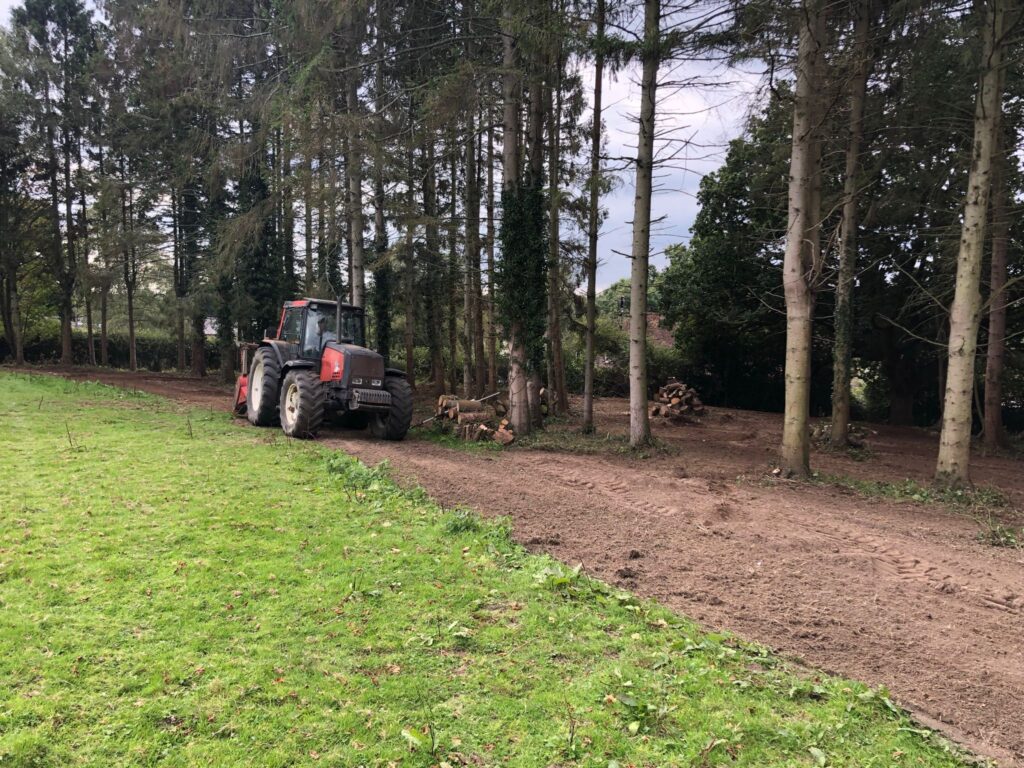 J V Tree Services, a professional tree surgeon in Crowborough, East Sussex, performing expert tree clearance and land management with heavy machinery.